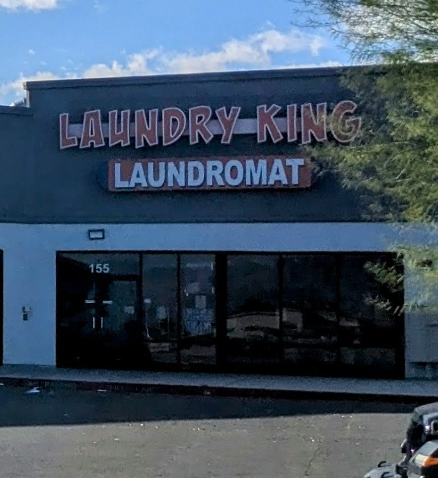 Laundry King Laundromat exterior sign and entrance at 921 W Owens Ave, Suite 155